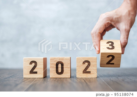 hand flip 2022 to 2023 block. goal, Resolution, strategy, plan,, motivation, reboot, forecast, change, countdown and New Year holiday concepts hand flip 2022 to 2023 block. goal, Resolution, strategy, plan,, motivation, reboot, forecast, change, countdown and New Year holiday concepts 95138074