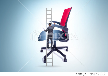 Businessman in the career concept climbing chair 95142605