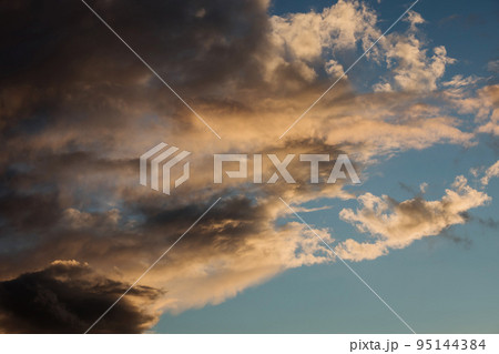 sunset sky and dark clouds 95144384