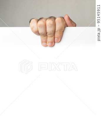 Male Hand Holding Empty White Background with Copy Space Male Hand Holding Empty White Background with Copy Space 95145911