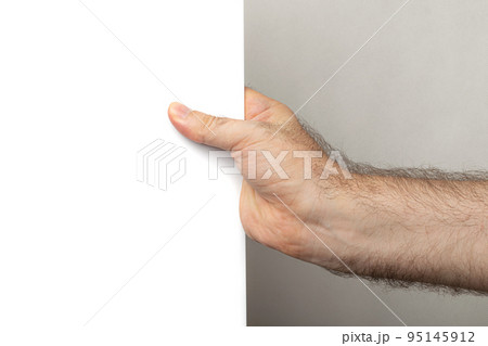 Male Hand Holding Empty White Background with Copy Space Male Hand Holding Empty White Background with Copy Space 95145912