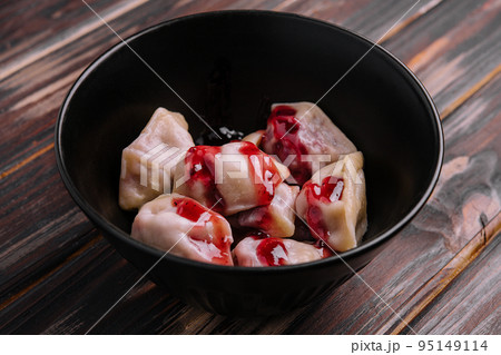 Delicious dumplings with cherries and jam 95149114