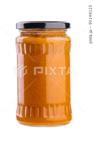 The glass jar with squash caviar on white The glass jar with squash caviar on white 95149125