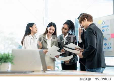 Startup young business team brainstorming on meeting working for financial marketing report. Startup young business team brainstorming on meeting working for financial marketing report. 95149613