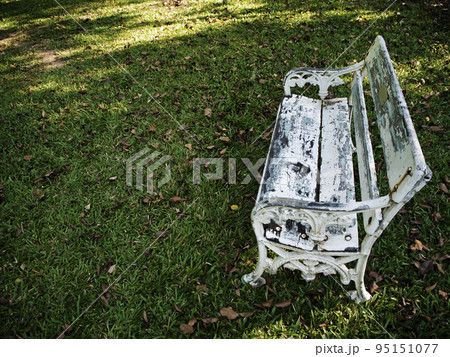 Old white field chairs on the lawn Old white field chairs on the lawn 95151077