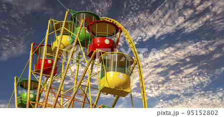Attraction (carousel) ferris wheel against the background of a romantic evening sky 95152802