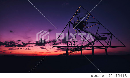 Viewing platform Tetraeder Bottrop in Bottrop, Germany at sunset. 95156418