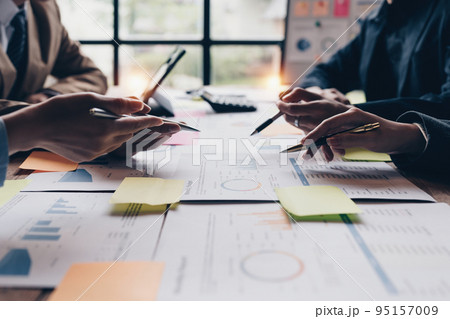 Business teamwork analyzing future digital marketing strategies. digital and big data concept Business teamwork analyzing future digital marketing strategies. digital and big data concept 95157009