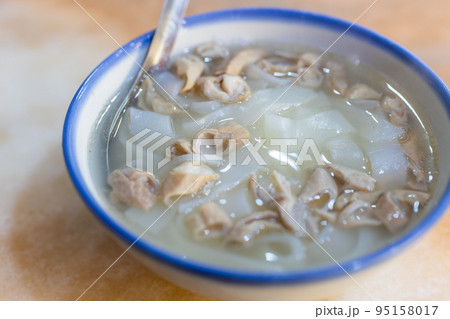 Pork intestine rice flat noodle in restaurant 95158017
