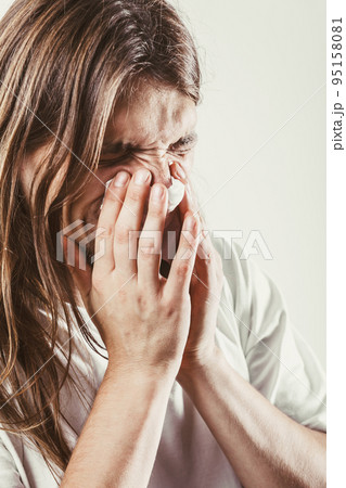 Man with hygienic tissue Man with hygienic tissue 95158081