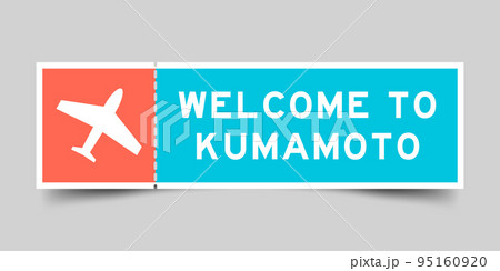 Orange and blue color ticket with plane icon and word welcome to kumamoto on gray background 95160920