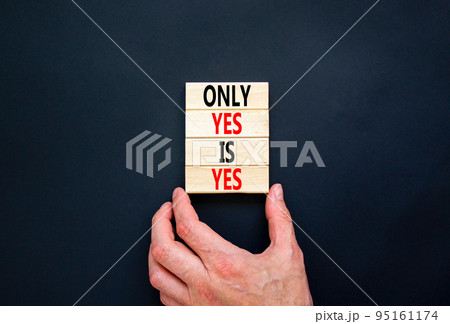 Only yes is yes symbol. Concept words Only yes is yes on wooden blocks on a beautiful black table black background. Businessman hand. Business, psychological only yes is yes concept. Only yes is yes symbol. Concept words Only yes is yes on wooden blocks on a beautiful black table black background. Businessman hand. Business, psychological only yes is yes concept. 95161174