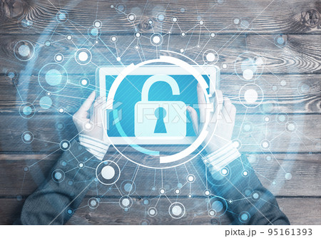 Concept of computer access with media lock icon on tablet screen Concept of computer access with media lock icon on tablet screen 95161393