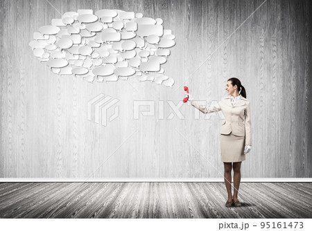Woman with red phone and empty speech bubble 95161473