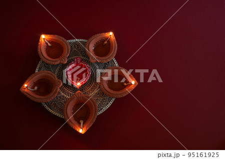 Happy Diwali. Diya lamps lit during diwali festve celebration 95161925