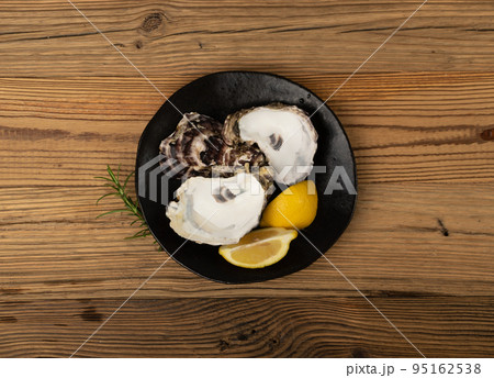 Empty Oyster Shell on Wood Table, Eaten Mollusc 95162538