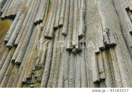 natural background, rock fragment from volcanic lava pillars natural background, rock fragment from volcanic lava pillars 95163557