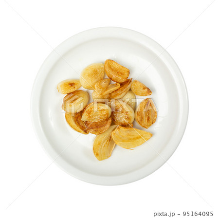 Fried Garlic Cloves Pile Isolated on White Background 95164095