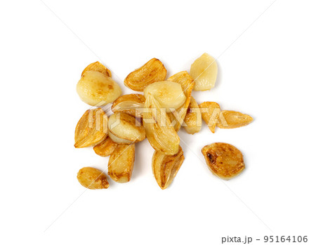 Fried Garlic Cloves Pile Isolated on White Background Fried Garlic Cloves Pile Isolated on White Background 95164106