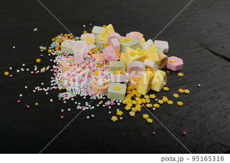 Tablet Candies on Black Stone, Compressed Tablets 95165316