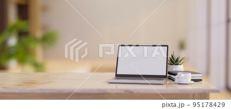 Close-up, Luxury bright workspace with laptop mockup and copy space on white marble tabletop 95178429
