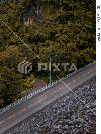 Beautiful aerial view of Mountain asphalt road in the autumn season. Beautiful aerial view of Mountain asphalt road in the autumn season. 95191006
