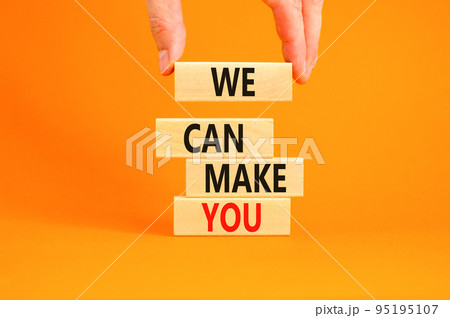Support and we can make you symbol. Concept words We can make you on wooden blocks. Beautiful orange background. Businessman hand. Business psychological we can make you concept. Copy space. 95195107