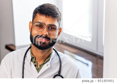 Tired doctor in clinik at long day working full time Tired doctor in clinik at long day working full time 95195401