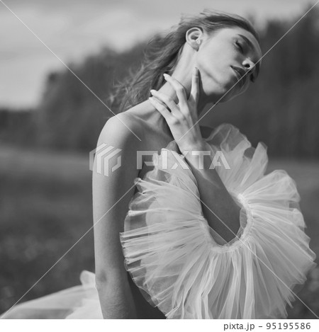 Sexy blonde in dress posing in nature. Art portrait of nude woma Sexy blonde in dress posing in nature. Art portrait of nude woma 95195586