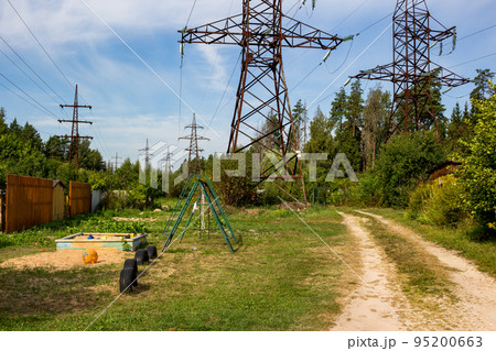 High-voltage power line passing over summer cottages High-voltage power line passing over summer cottages 95200663