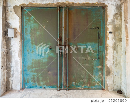 iron garage doors with peeling paint 95205090