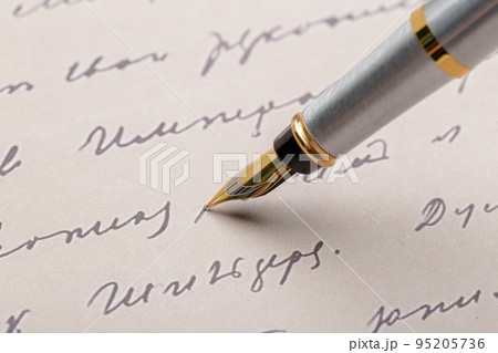 Fountain Pen on Written Page 95205736