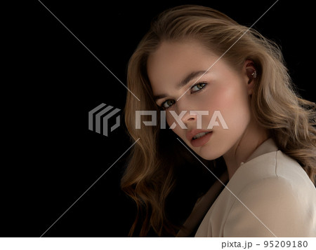 Fashionable girl in stylish clothes. A young 95209180