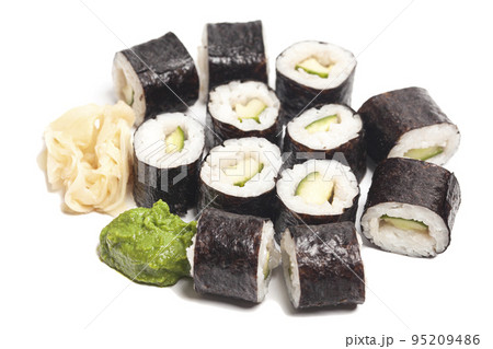 Sushi rolls cucumber japanese food isolated on white background. Sushi rolls cucumber japanese food isolated on white background. 95209486