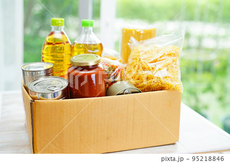 Foodstuffs in donation box for volunteer to help people. 95218846