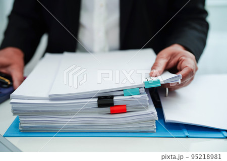 Business woman busy working with documents in office. 95218981