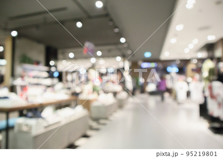 Abstract blur clothing boutique display interior of shopping mall background Abstract blur clothing boutique display interior of shopping mall background 95219801