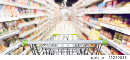 Abstract blur supermarket aisle with product on shelves defocused background Abstract blur supermarket aisle with product on shelves defocused background 95220058