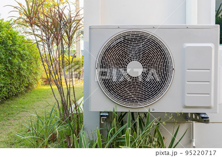 Air condition outdoor unit compressor install outside the house Air condition outdoor unit compressor install outside the house 95220717