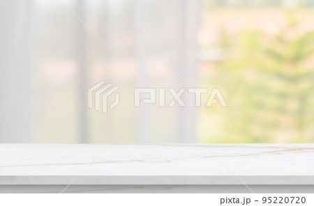 Empty marble table top with blur window curtain background Empty marble table top with blur window curtain background 95220720