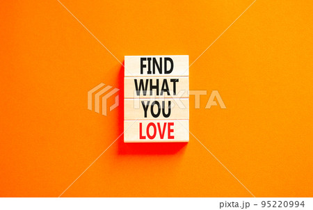 Find what you love symbol. Concept words Find what you love on wooden blocks. Beautiful orange table orange background. Business, psychological find what you love concept. Copy space. 95220994