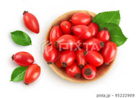 Rose hip in wooden bowl isolated on a white background with full depth of field. Top view. Flat lay Rose hip in wooden bowl isolated on a white background with full depth of field. Top view. Flat lay 95222909