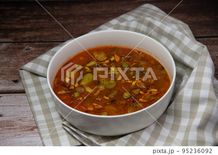 Automn Soup with beans and pea in white bowl Automn Soup with beans and pea in white bowl 95236092