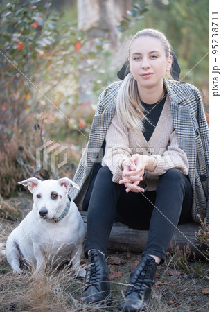 Young attractive woman playing with dog Young attractive woman playing with dog 95238711