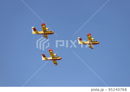 Seaplane. Airplane. Military vehicle. Spanish Air Force on the day of the National Holiday of October 12 flying over the streets of the city of Madrid. MADRID, SPAIN - OCTOBER 12, 2022. Seaplane. Airplane. Military vehicle. Spanish Air Force on the day of the National Holiday of October 12 flying over the streets of the city of Madrid. MADRID, SPAIN - OCTOBER 12, 2022. 95240768