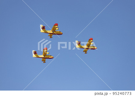 Seaplane. Airplane. Military vehicle. Spanish Air Force on the day of the National Holiday of October 12 flying over the streets of the city of Madrid. MADRID, SPAIN - OCTOBER 12, 2022. 95240773