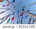 Doha, Qatar - October 9, 2022: The Flag Plaza, displays 119 flags from countries with authorized diplomatic missions, including flags of the European Union, the United Nation and the GCC. 95241285