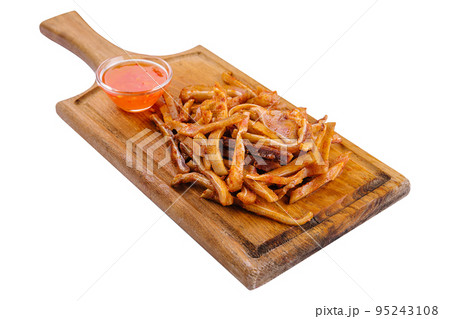 Delicious pork ears snack plate on white 95243108