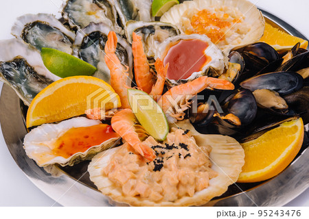fresh shellfish seafood platter close up 95243476