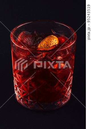 red drink cocktail in glass jar with cherry red drink cocktail in glass jar with cherry 95243519